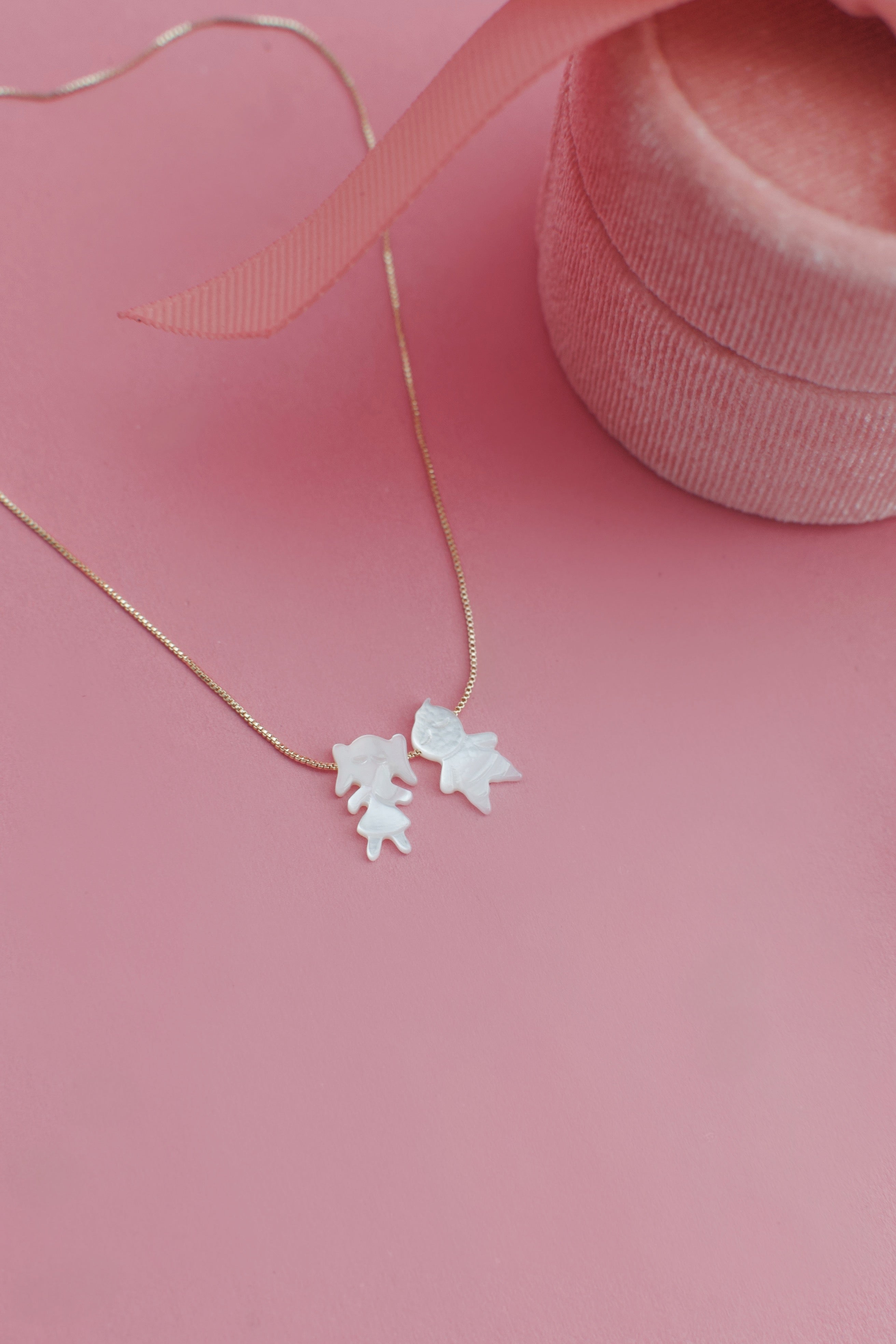 Boy and Girl Charm White Shell Necklace