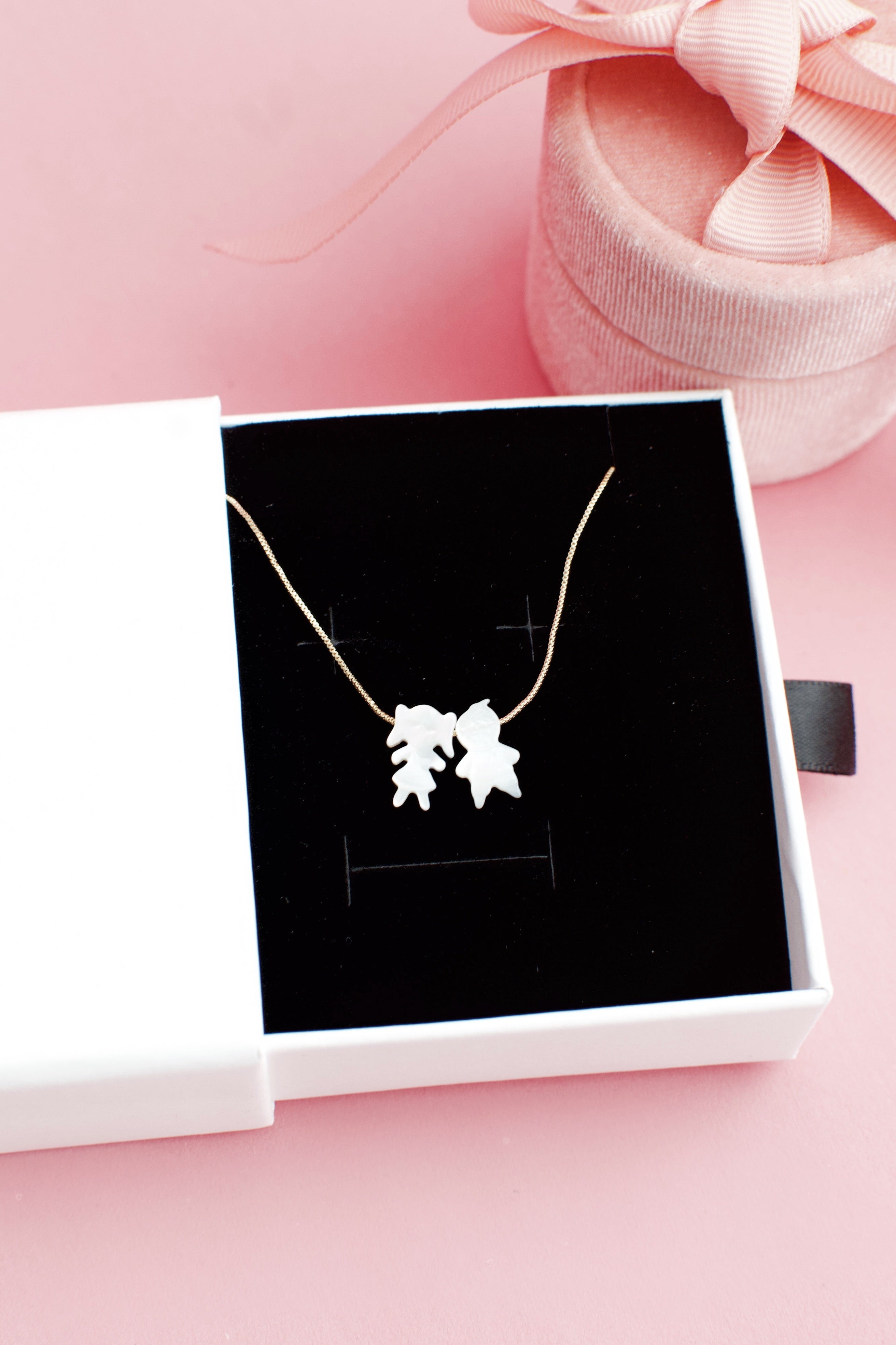 Boy and Girl Charm White Shell Necklace